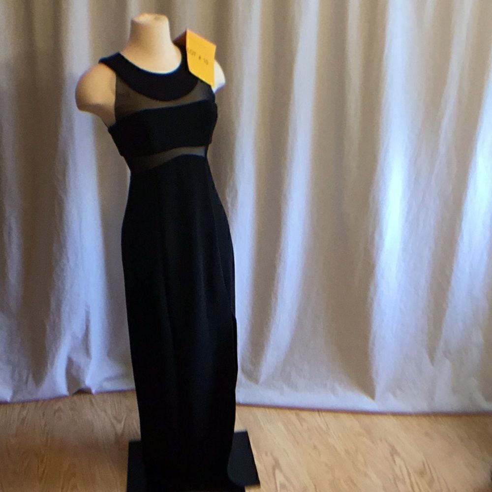 Long black cocktail dress in small w/mesh inserts